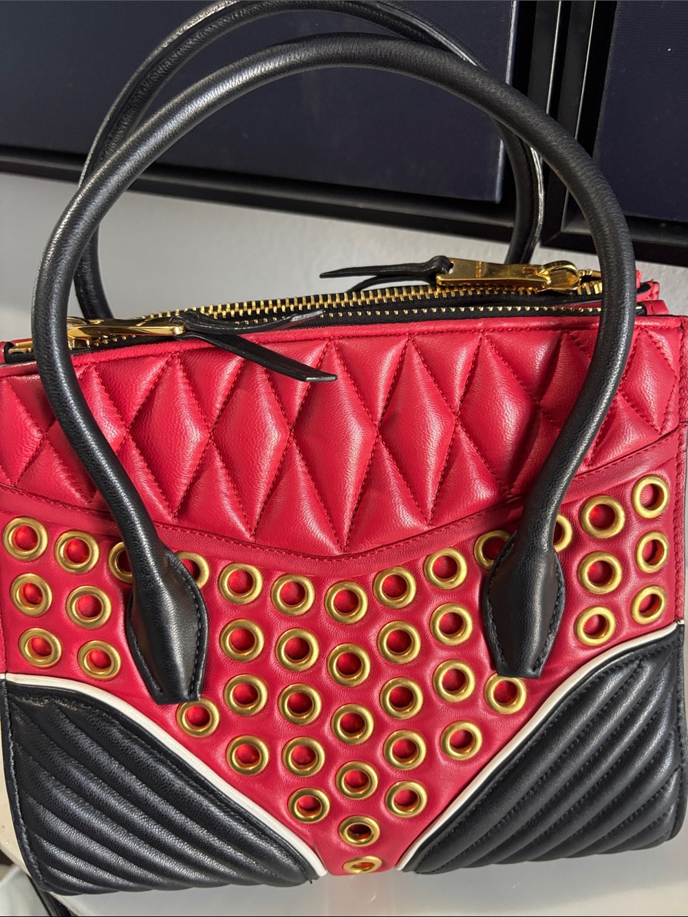 Authentic Miu Miu Red and Black Quilted Leather Satchel with Gold Eyelet Detail - Picture 2 of 7